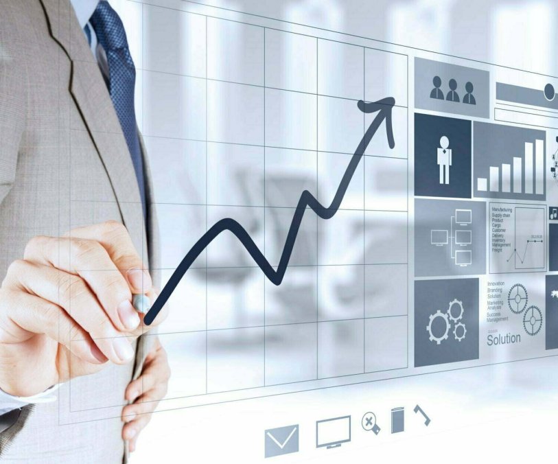 businessman hand working with new modern computer and business strategy as concept